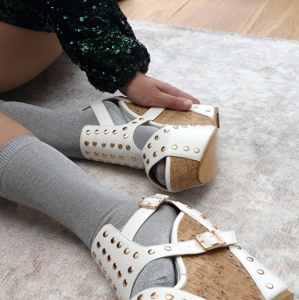 White platform wedge shoes with gold studs and silver metallic socks